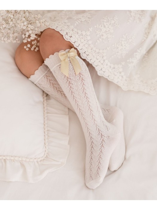 Kids' openwork knee socks with a bow