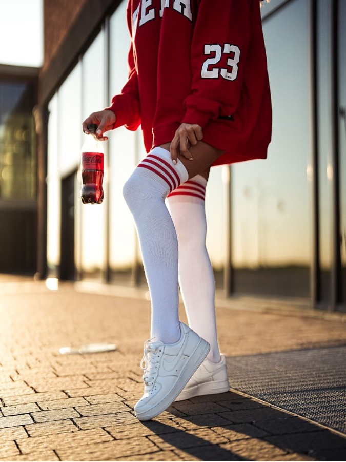 Cotton over-the-knee socks with a striped welt...