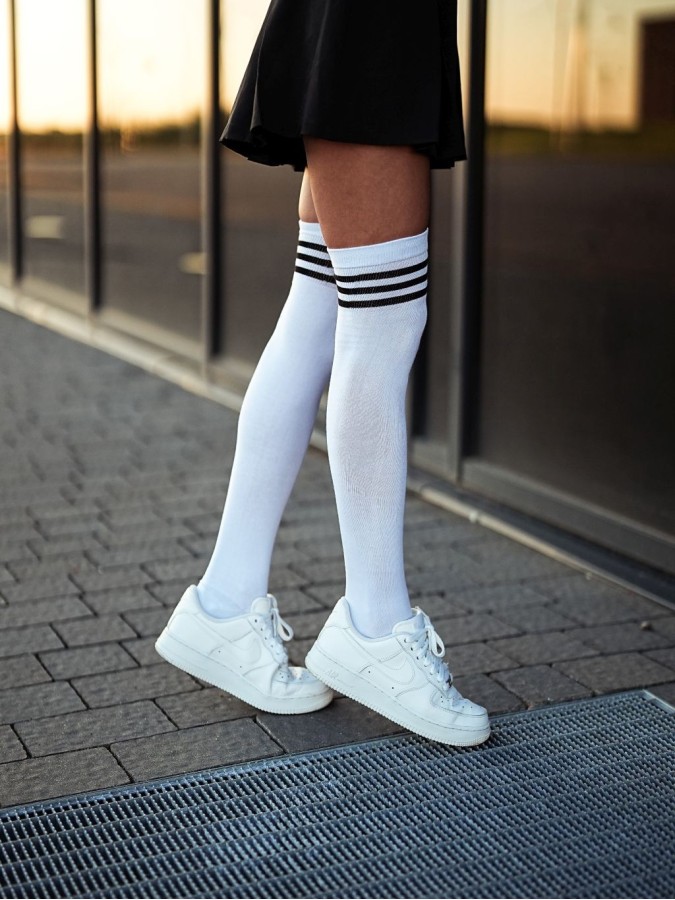 Cotton over-the-knee socks with a striped welt...