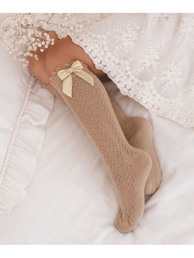 Kids' openwork knee socks with a bow