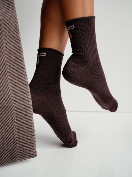 Women's bandless ribbed socks with a bow 0200.193